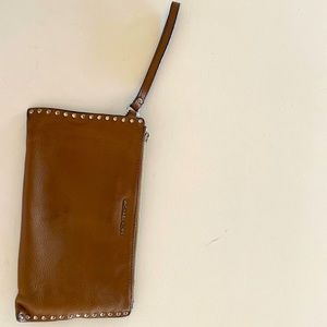 AUTHENTIC MICHAEL KORS camel leather clutch .